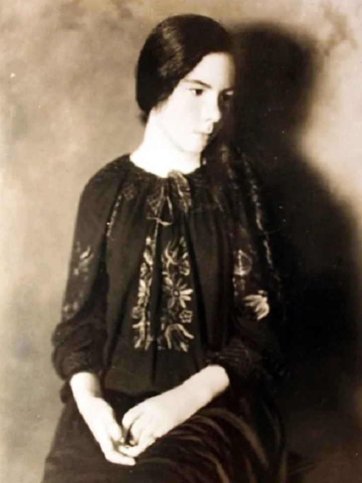 Follett sitting for a photo shortly before her debut novel was released.