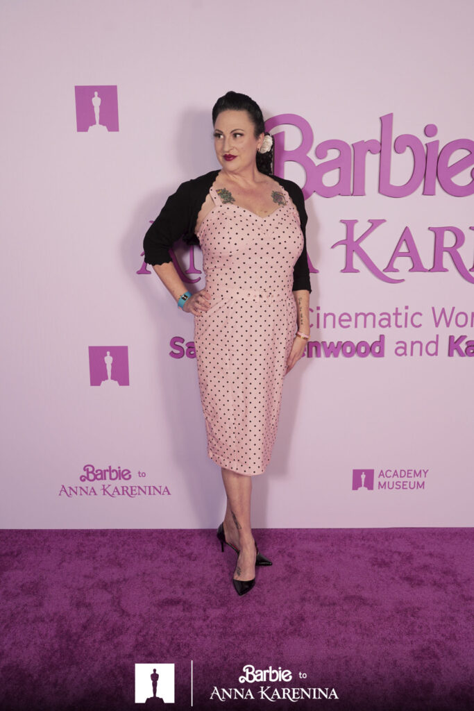 Regina Luz Jordan at the Academy Museum Set Design Exhibit Barbie to Anna Karenina featuring ther work by Sarah Greenwood and Katie Spencer