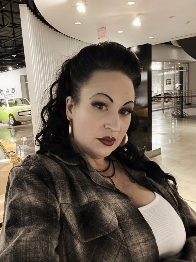 Regina Luz Jordan founder of Hollywoodland News at the Petersen Automotive Museum for their Totally Awesome Exhibit on 80s and 90s cars and culture. Photo by Mark Jordan for Hollywoodland News