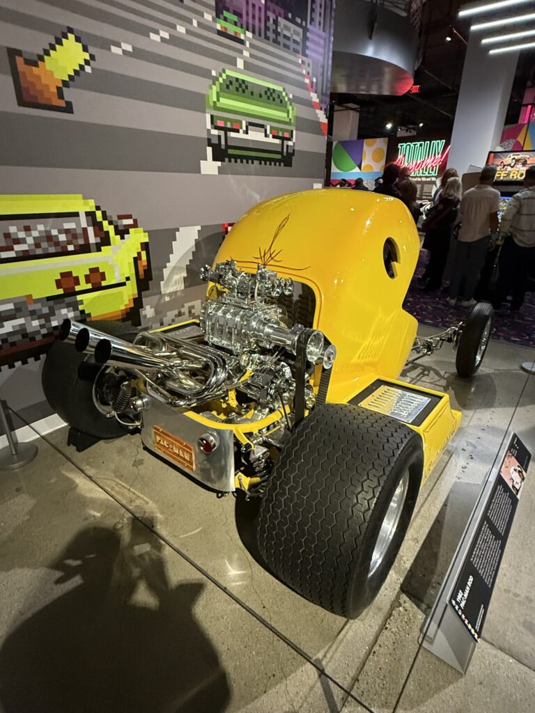 1982 Pac-Man Rod by Hot Wheels designer Larry Wood modeled after the 1980 maze video game developed and published by Namco. This car is on exhibit at the Totally Awesome Exhibit at the Petersen Automotive Museum. As photographed by Regina Luz Jordan for Hollywoodland News