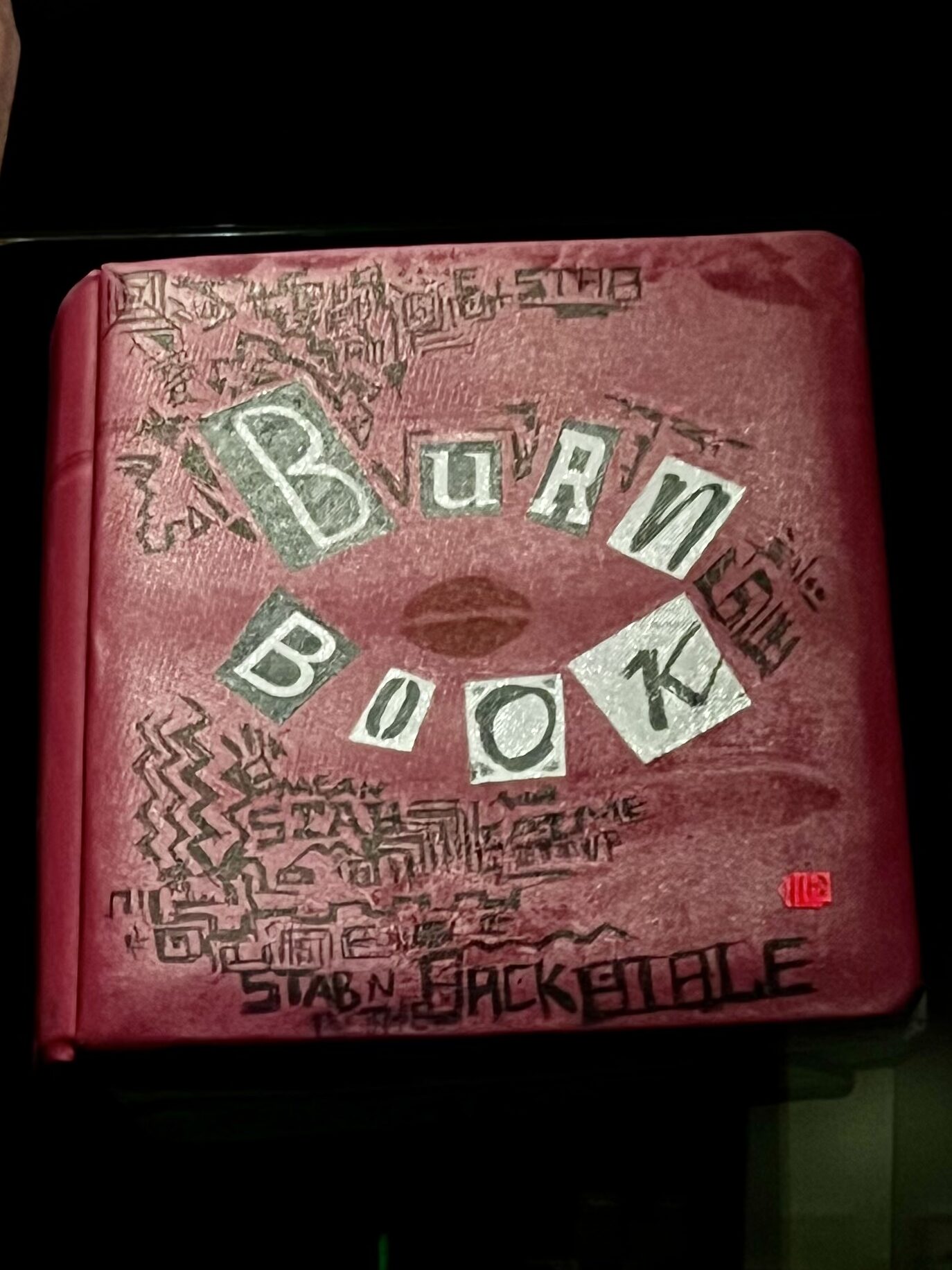 Burn Book from the film Mean Girls as photographed at the Color In Motion Exhibit at the Academy Museum by Regina Luz Jordan for Hollywoodland News Article: Fashionable Fictional Characters
