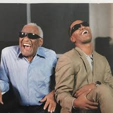 Jamie Foxx and Ray CHarles while filming the movie Ray (2004) Courtesy of Universal Pictures with costumes designed by Sharen Davis