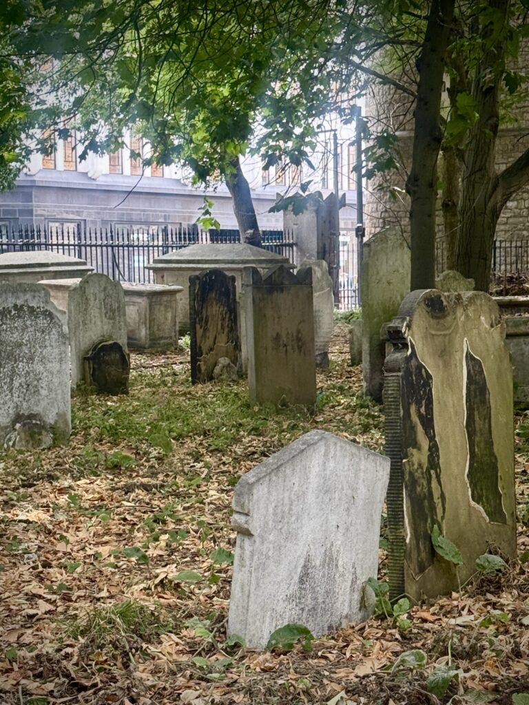 Magnificent Seven Cemeteries toppled and stacked gravestones as featured in the Bunhill Fields photographed by Kristin Wojkowski for Hollywoodland News