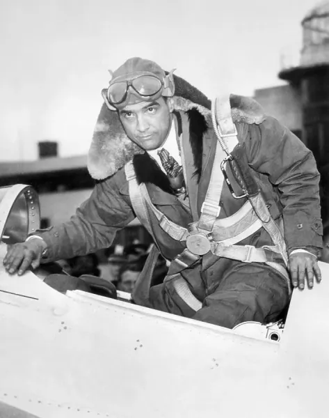 Director Howard Hughes inside the cockpit of a plane during the filming of Howard Hughes Hell's Angels.