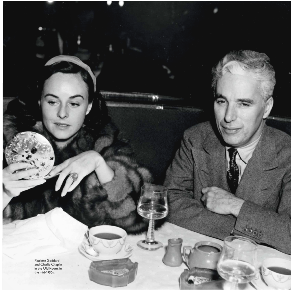 Charlie Chaplin pictured dining in Hollywood with Paulette Goddard. Photo Courtesy of the Musso & Frank Grill